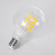 GloboStar® 99088 Λάμπα LED Long Filament E27 G95 Γλόμπος 7W 1470lm 360° AC 220-240V IP20 Φ9.5 x Υ13.8cm Θερμό Λευκό 2700K με Διάφανο Γυαλί - Pro Series 210lm/W - A Ενεργειακή Κλάση - 3 Χρόνια Εγγύηση